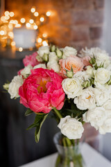 Pink peony and white roses bouquet