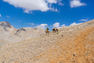 People traveling in Aladaglar. Aladağlar and Yedigöller regions where important mountaineering...