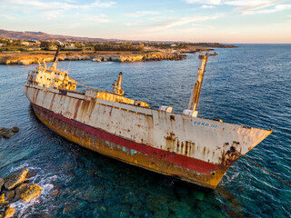 Cyprus - Abandoned shipwreck EDRO III in Pegeia, Paphos, Cyprus from drone view at amazing sunset...