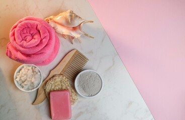 wooden items, a hairbrush, and body care products. bath salt, natural clay, and sponge. means for relaxation and rest. meditation and spa treatments. natural products.