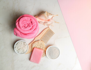 wooden items, a hairbrush, and body care products. bath salt, natural clay, and sponge. means for relaxation and rest. meditation and spa treatments