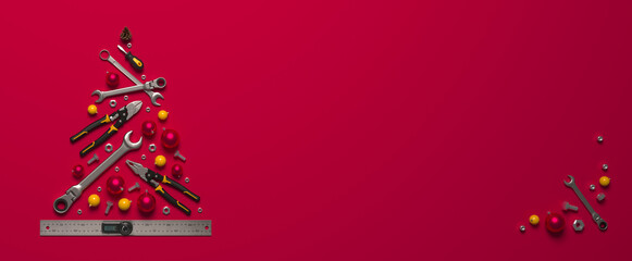 A symbolic Christmas tree made of construction tools on a blue background. Creative template of a New Year greeting for building and engineering companies. 3D render.