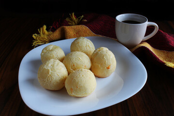 Cheese breads and coffee. Cheese bread, traditional brazilian snack. Brazilian breakfast.