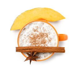 Cup of tasty pumpkin latte on white background