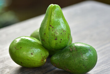 The avocado, Persea americana, sweet and delicious fruit, is classified as a member of the flowering plant family Lauraceae.