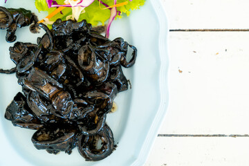 fried squid with squid ink sauce