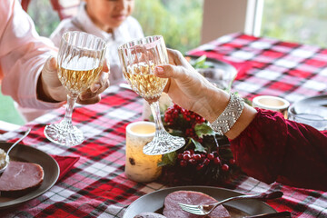 Happy family having a Christmas dinner at home