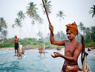 Traditional stilt fishermen in Sri Lanka.