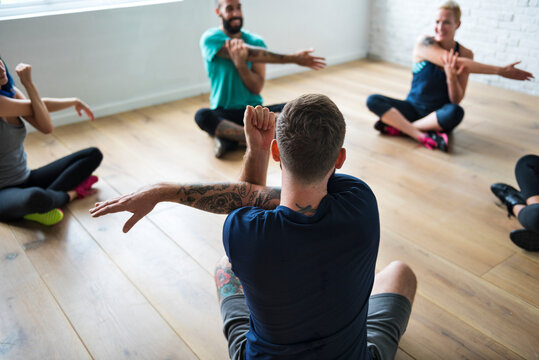 Group of diverse people are joining a yoga class