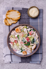 Traditional pasta with poultry and vegetables