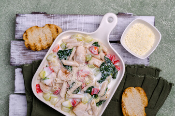 Traditional pasta with poultry and vegetables