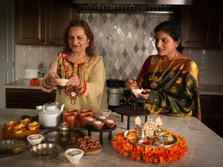 Women prepping for Diwali 