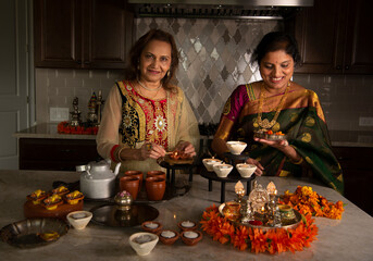 Women prepping for Diwali 