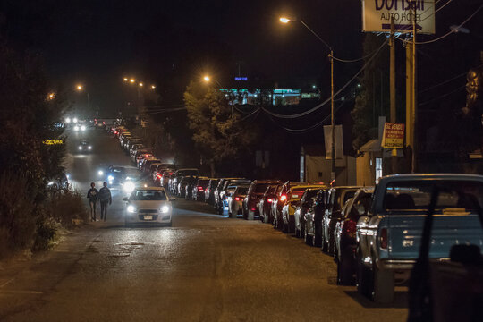 Cars line up to enter a gas station to buy gasoline in Morelia