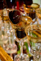 cup with glasses inside
