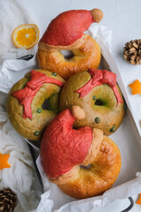 Obraz na płótnie Canvas Festive homemade pastry. Christmas Theme Baked and Unbaked Bagel. Great for breakfast, friends and family gatherings and celebrations and between meals snack.