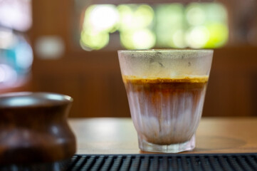 A Glass of coffee called Dirty Coffee, Coffee with milk