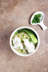 Mie Sup pangsit or Noodle wonton soup is Chinese wonton dumpling with noodle in clear soup