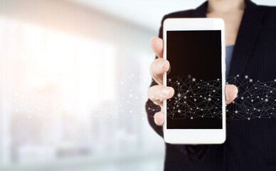 Automation Software Technology Process System Business concept. Hand hold white smartphone with digital hologram wave sign on light blurred back. Innovative, global network , Data exchanges.