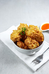 Uyen or talas goreng or fried taro is a popular fried snack from Medan, Indonesia, made from taro and shrimp