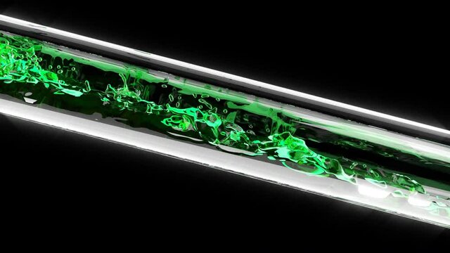 Green liquid flowing through glass tube chemical biological experiment medical tests 4k