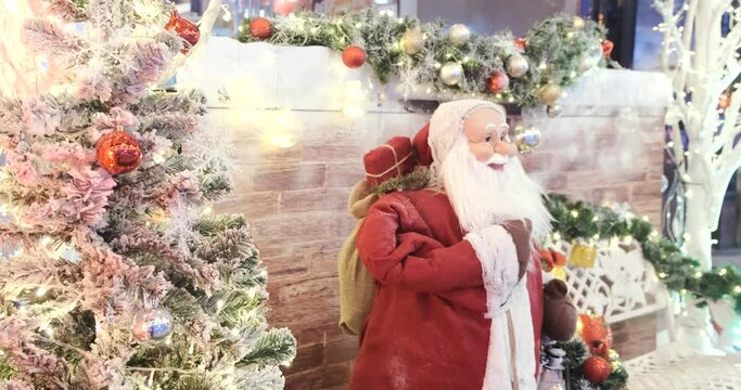 Santa sitting on bench with christmas ball and tree celebrate merry x mas