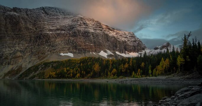 Time Lapse, Sunrise on Cold Autumn Morning Above Floe Lake and Snow Capped Hills of Kootenay National Park, British Columbia, Canada