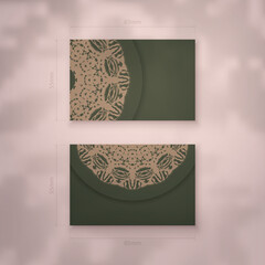 Business card in green color with vintage brown ornament for your business.