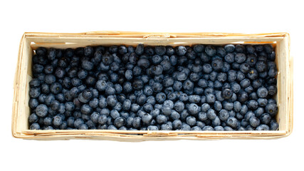 Blueberry fruits in a container from a tree isolated on a white background, top view. Fresh blueberries in a wooden container. Dark blue, ripe, raw blueberries, top view. Ripe blueberries, top view.