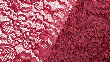 Texture, cloth, background. Red, burgundy lace fabric with a pattern