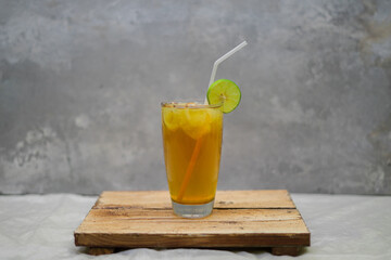 a refreshing glass of iced lemon tea