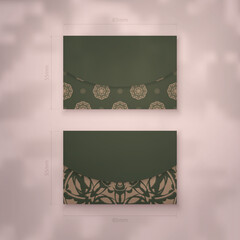 Business card in green with vintage brown pattern for your brand.