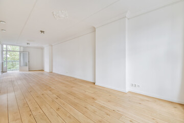 Long wide large light room with doors at the beginning