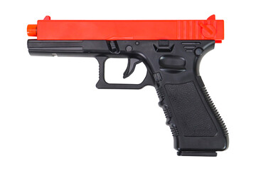 Black and red toy gun on a white background, isolated image