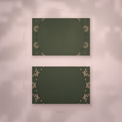 Business card template in green color with luxurious brown ornament for your brand.