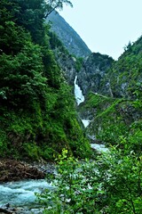 Fototapeta na wymiar Austrian Alps - view of the Simms waterfalls in the Hohenbachtal gorge near the town of Holzgau