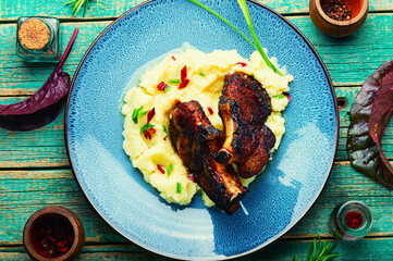 Fried meat with mashed potatoes