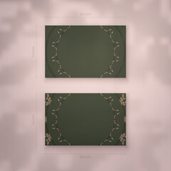 Business card template in green with Indian brown pattern for your personality.