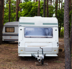 Camping trailers in the forest.