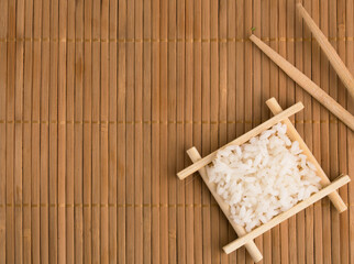 boiled rice with Japanese chopsticks
