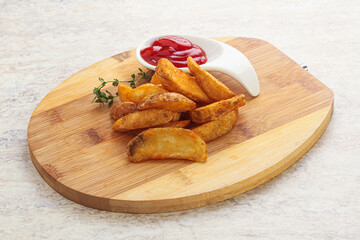 Fried rustic potato with tomato ketcup