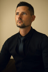 Fototapeta premium a businessman man in a black suit