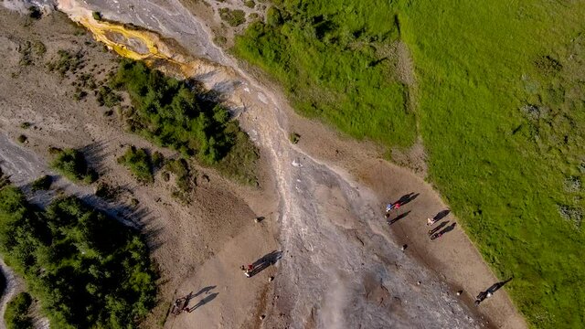 Aerial Cinematic footage of the Impressive Icelands Geysir Geisir in the Golden Circule, the geothermal activity and a attraction for tourists in Iceland	