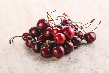 Ripe sweet cherry berries heap