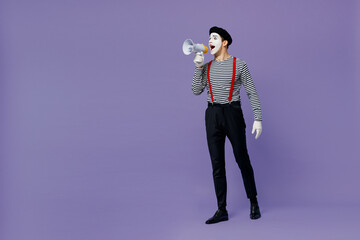Full size body length young mime man with white face mask wears striped shirt beret hold scream in...
