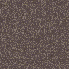 Seamless vector background with random circles. Abstract broen and golden ornament. Golden abstract pattern