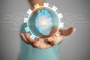 Health care concept symbol human heart on hand