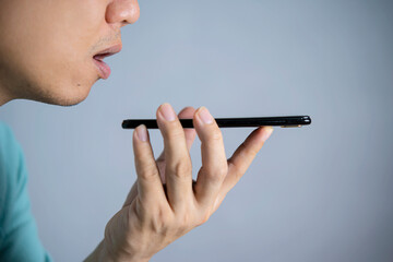 Man use smart phone talk chat send text to 5G wifi mic VoIP deep tech ai bot app