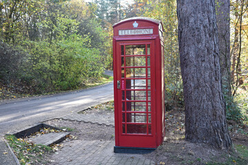 Sherwood Forest, UK - 17 Nov, 2021: Traditional British Red Public Telephone Box in a Nottinghamshire forest