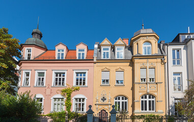 colorful historic house facades with turrets and gables, munich district Neuhausen - obrazy, fototapety, plakaty